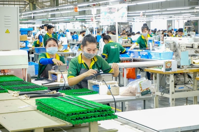 Les entreprises manufacturières vietnamiennes voient leurs commandes à l'exportation augmenter en juillet 2024. Photo reproduite avec l'aimable autorisation du portail d'information du ministère de l'industrie et du commerce.